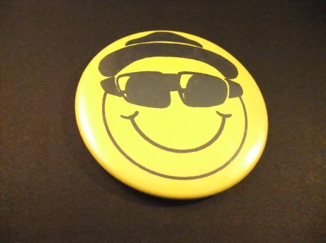 Acid house muziekstroming jaren 80 smiley ( Blues Brothers)